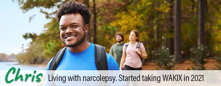 Chris, a real person living with narcolepsy taking WAKIX, walking outside